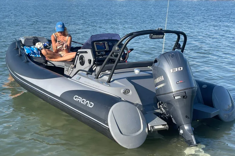 Slide: The Image of 2017 Grand Goldenline 500 boat with Yamaha 130 engine on calm water. - 24
