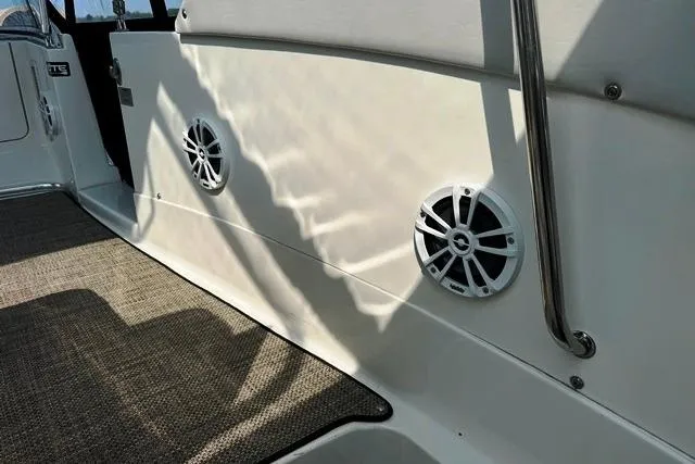 Slide: The Image of 2004 Silverton 35 MY Aft Cabin Motoryacht interior with speakers and carpeted floor. - 30