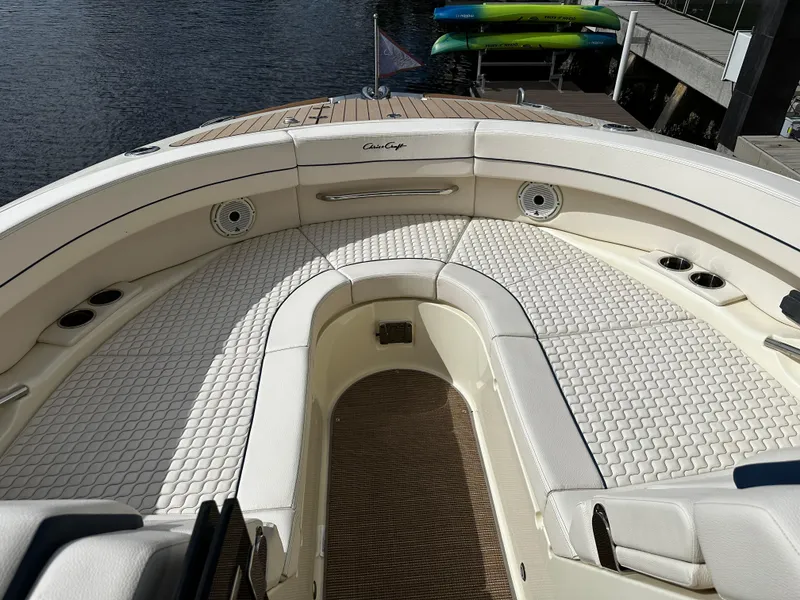 Slide: The Image of 2023 Chris-Craft Launch 31 GT boat interior with luxurious seating and elegant design. - 13