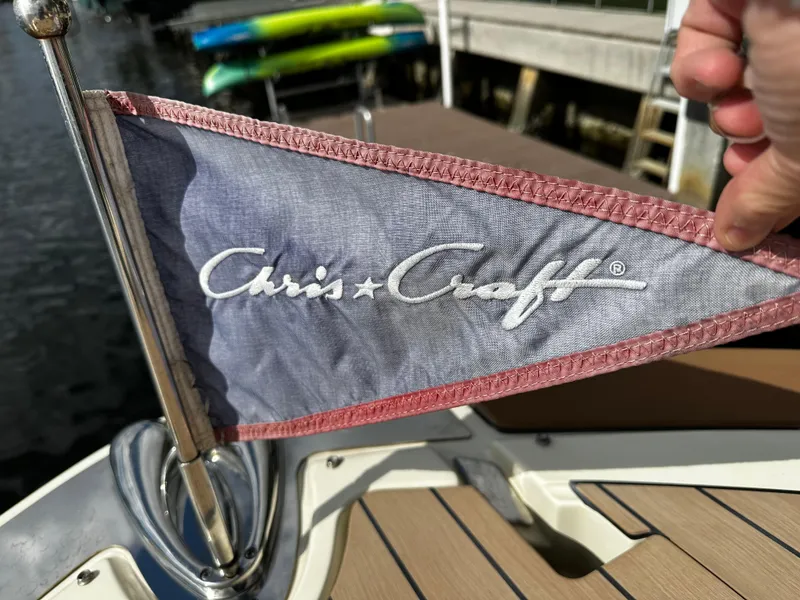 Slide: The Image of Chris-Craft Launch 31 GT 2023 flag on boat deck, close-up view. - 14
