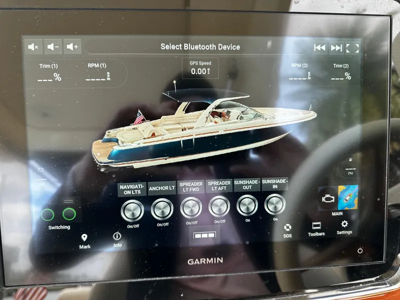 Slide: The Image of Garmin display showing 2023 Chris-Craft Launch 31 GT boat controls and settings. - 8