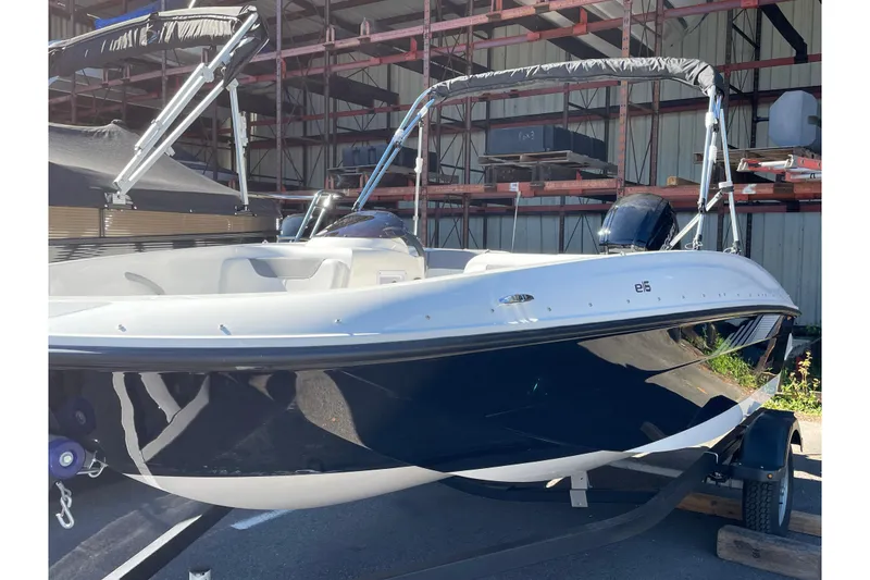 Slide: The Image of 2026 Bayliner Element E16 boat in storage, featuring sleek design and modern features. - 10