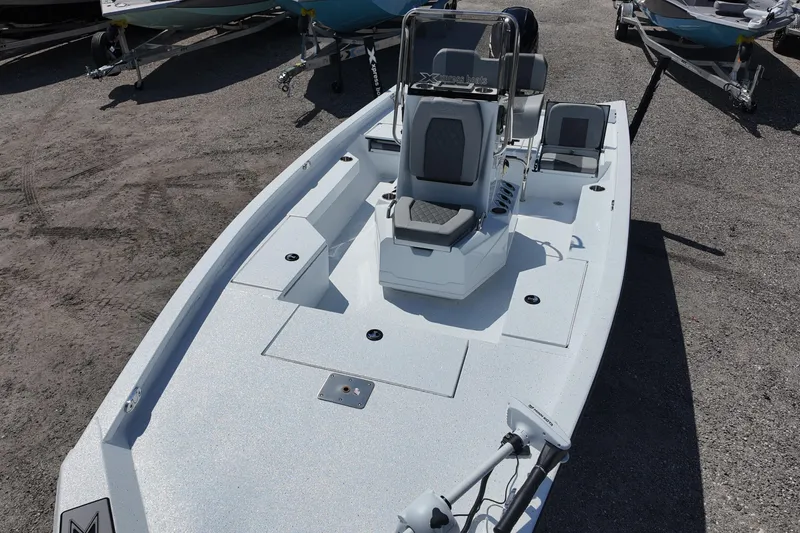 Slide: The Image of 2026 Xpress H20 boat with sleek design, spacious deck, and modern seating. - 12