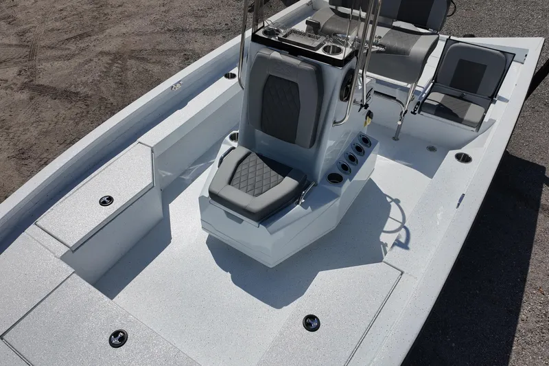 Slide: The Image of 2026 Xpress H20 boat interior with seating and console, featuring modern design and functionality. - 13