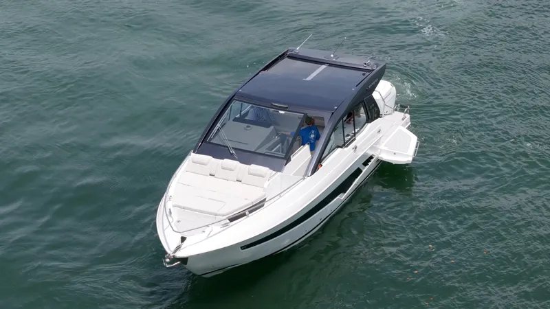 Slide: The Image of 2025 Schaefer 375 yacht cruising on open water, featuring sleek design and modern amenities. - 4