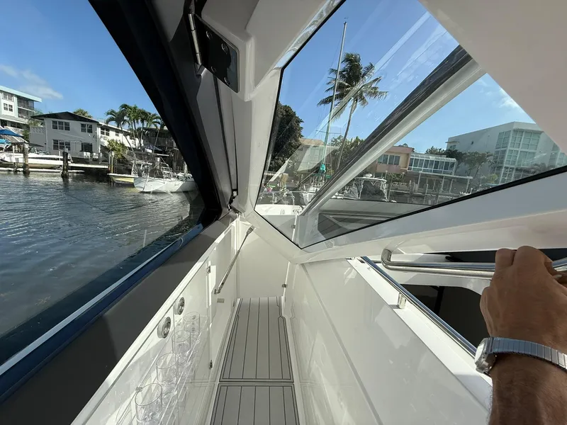 Slide: The Image of Interior view of 2025 Schaefer 375 yacht with modern design and waterfront scenery. - 40