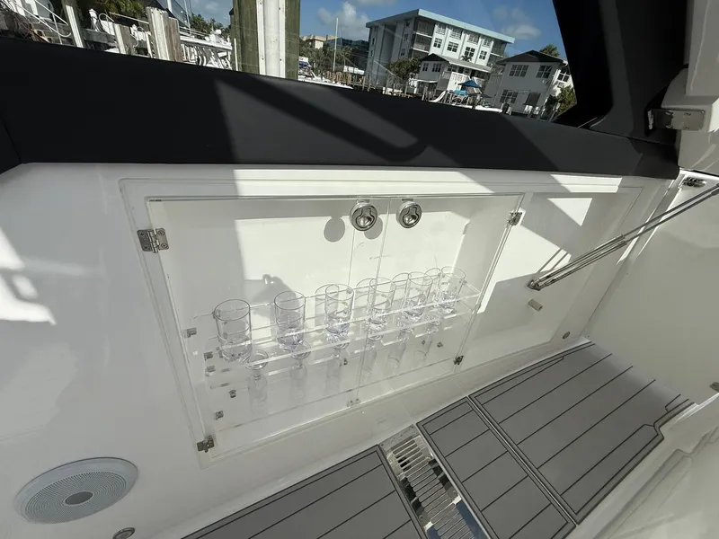 Slide: The Image of Interior of 2025 Schaefer 375 yacht with glass holders and modern design. - 42