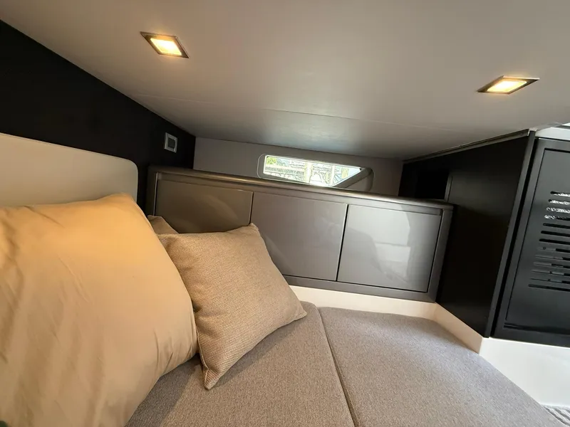 Slide: The Image of Luxurious interior cabin of 2025 Schaefer 375 yacht with modern design and cozy bedding. - 50