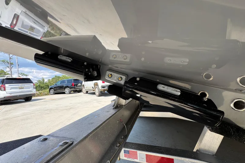 Slide: The Image of 2026 Yellowfin 39 Offshore boat on trailer, showing trim tabs and hull details. - 21