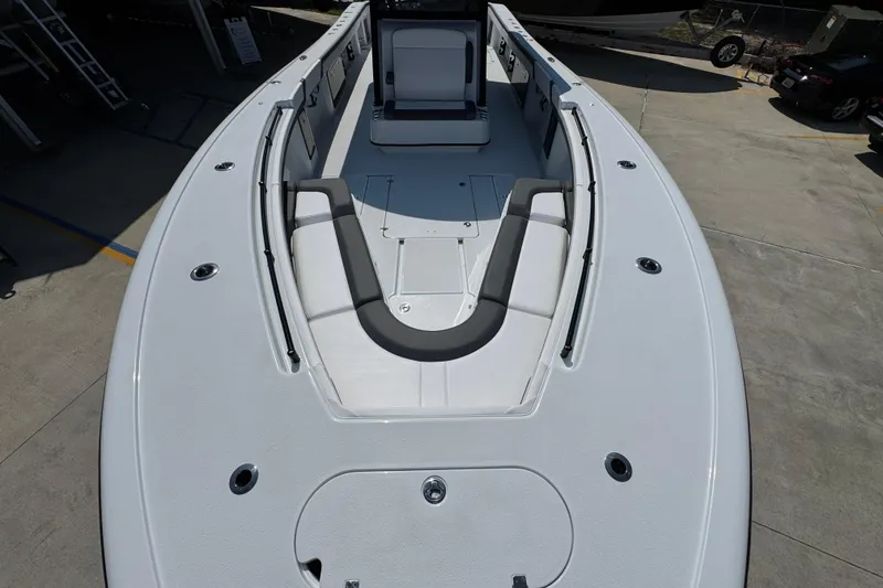 Slide: The Image of 2026 Yellowfin 39 Offshore boat deck with seating and storage compartments. - 25