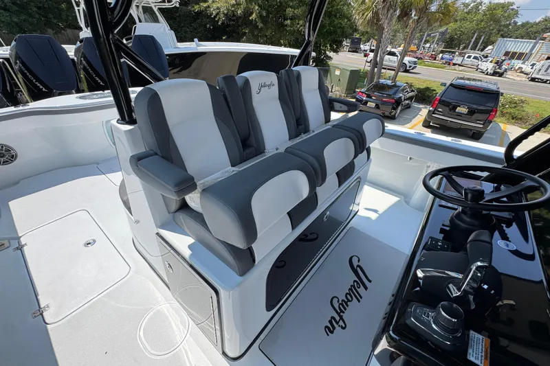 Slide: The Image of 2026 Yellowfin 39 Offshore boat interior with sleek seating and modern controls. - 38