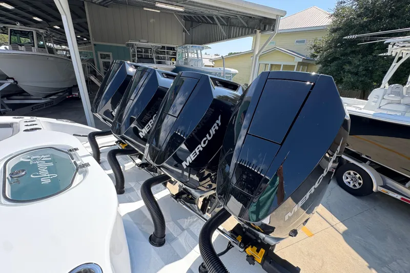 Slide: The Image of 2026 Yellowfin 39 Offshore boat with four powerful Mercury outboard engines. - 50