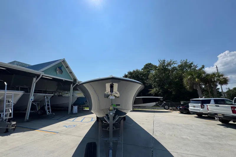 Slide: The Image of 2026 Yellowfin 39 Offshore boat on trailer at marina under clear blue sky. - 6