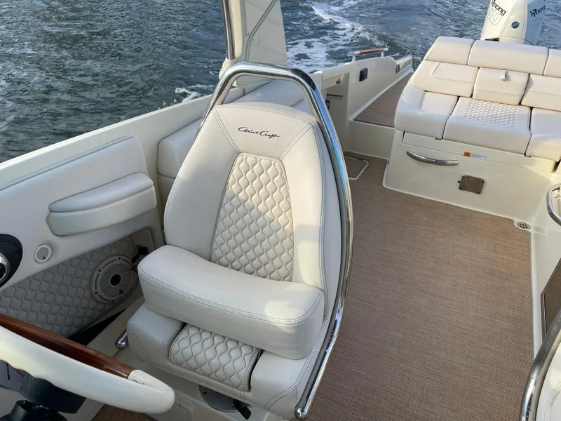 Slide: The Image of Luxurious interior of 2021 Chris-Craft 28 Launch GT boat with premium seating. - 14