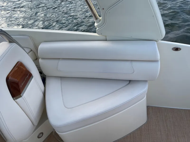 Slide: The Image of 2021 Chris-Craft 28 LAUNCH GT boat interior seating with white upholstery. - 20