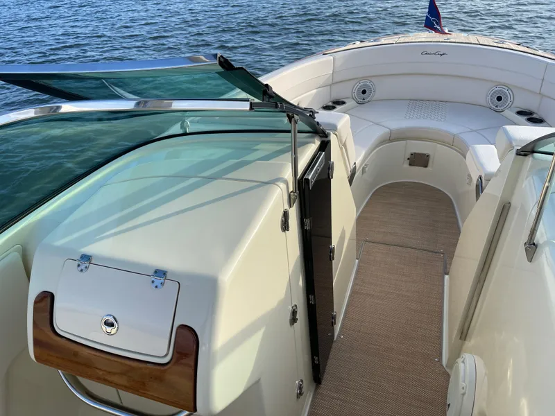 Slide: The Image of 2021 Chris-Craft 28 Launch GT boat interior with open deck and seating area. - 9