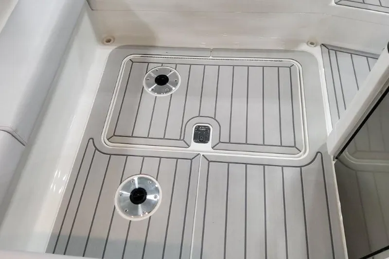 Slide: The Image of 2026 Formula 310 Bowrider deck with sleek, modern design and durable flooring. - 106