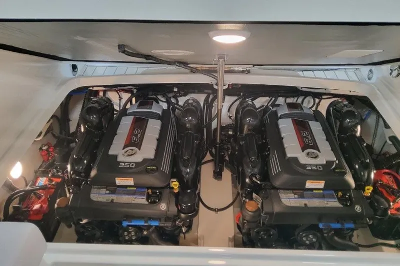 Slide: The Image of Twin engines in a 2026 Formula 310 Bowrider boat, showcasing powerful performance. - 107
