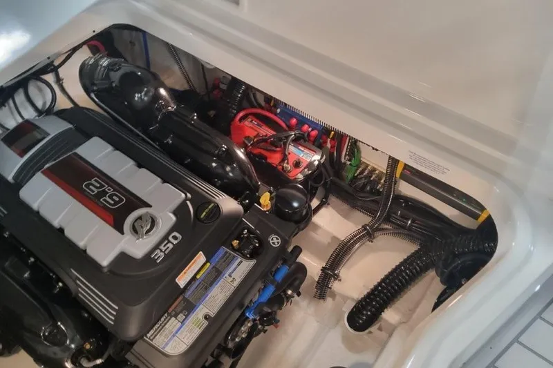 Slide: The Image of Engine compartment of 2026 Formula 310 Bowrider, featuring a 350 horsepower engine. - 109