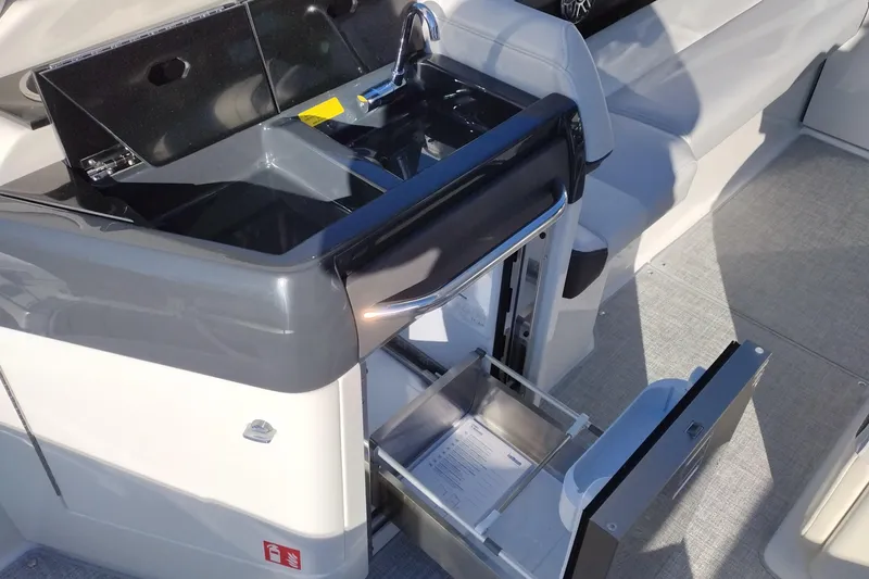 Slide: The Image of Rockford Fosgate audio system in 2026 Formula 310 Bowrider with Bluetooth and SiriusXM features. - 21