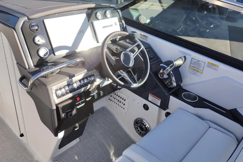 Slide: The Image of Luxurious seating in 2026 Formula 310 Bowrider boat, featuring sleek white upholstery. - 23