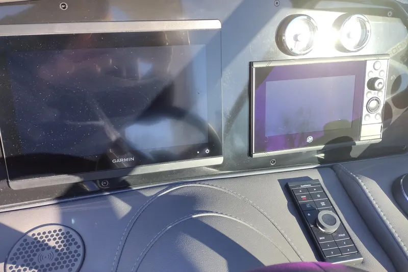 Slide: The Image of 2026 Formula 310 Bowrider interior with luxurious white seating and sleek design. - 25