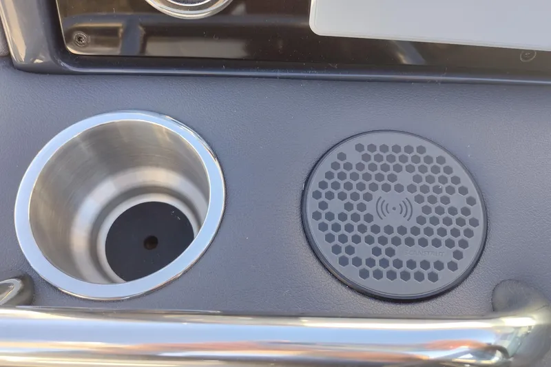 Slide: The Image of 2026 Formula 310 Bowrider interior with open mini fridge and sink. - 27