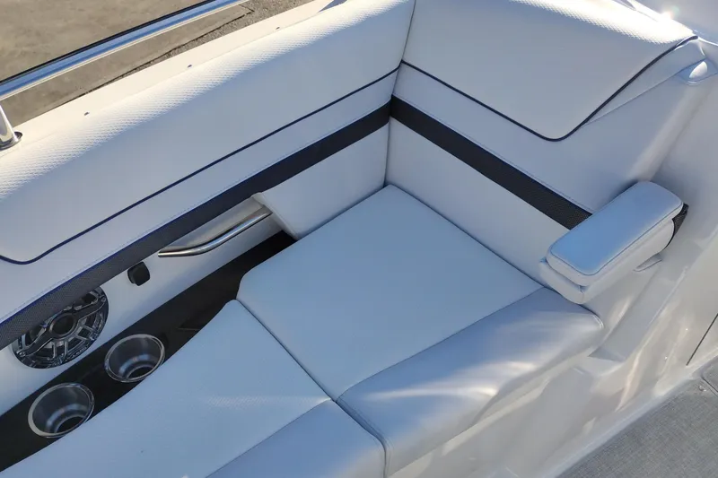 Slide: The Image of 2026 Formula 310 Bowrider boat deck with sleek, modern design and cup holders. - 34