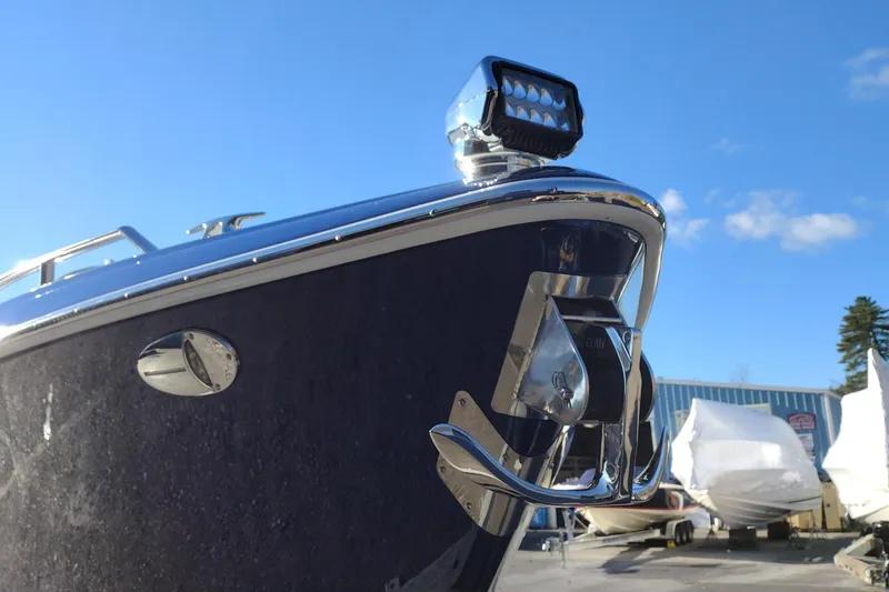 Slide: The Image of 2026 Formula 310 Bowrider on trailer, parked outdoors in snowy setting. - 4