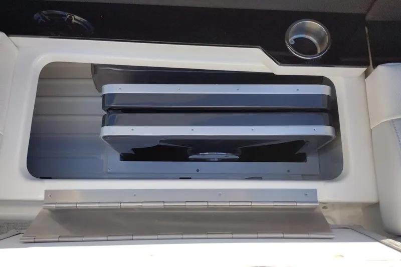 Slide: The Image of 2026 Formula 310 Bowrider boat with sleek design and modern features in a showroom. - 41