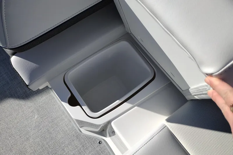 Slide: The Image of 2026 Formula 310 Bowrider boat in a spacious indoor facility. - 43