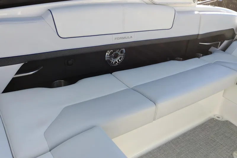 Slide: The Image of 2026 Formula 310 Bowrider boat in a workshop, showcasing sleek design and craftsmanship. - 44
