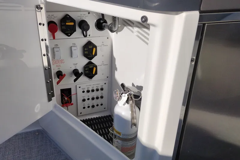 Slide: The Image of 2026 Formula 310 Bowrider boat with dual propellers in a garage setting. - 45