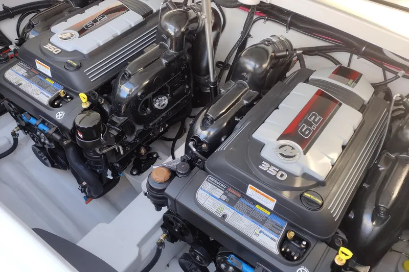 Slide: The Image of 2026 Formula 310 Bowrider interior with sleek white seating and modern design elements. - 51