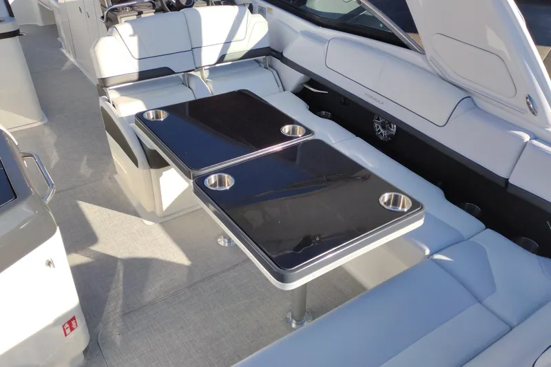 Slide: The Image of 2026 Formula 310 Bowrider boat interior with packaged components in storage area. - 52