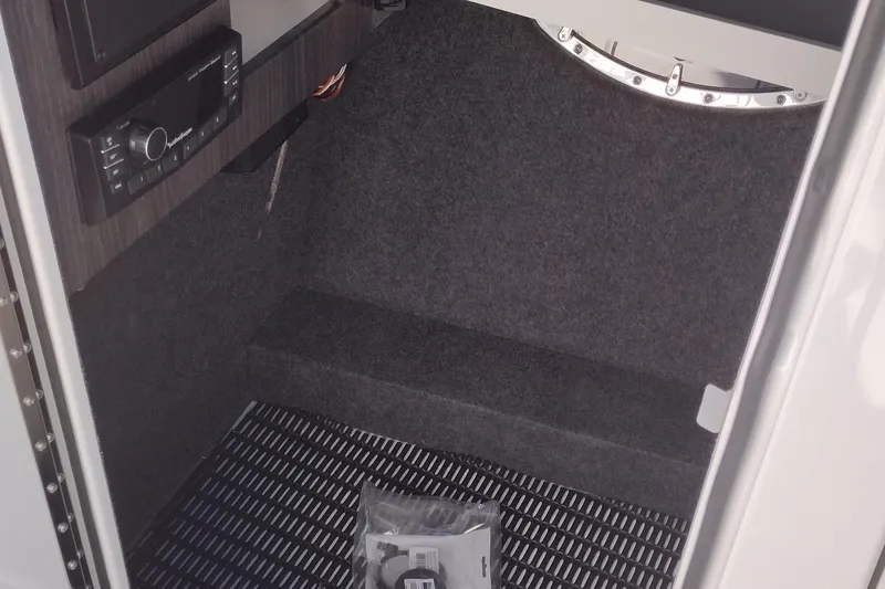 Slide: The Image of 2026 Formula 310 Bowrider interior seating with sleek white upholstery and modern design. - 57