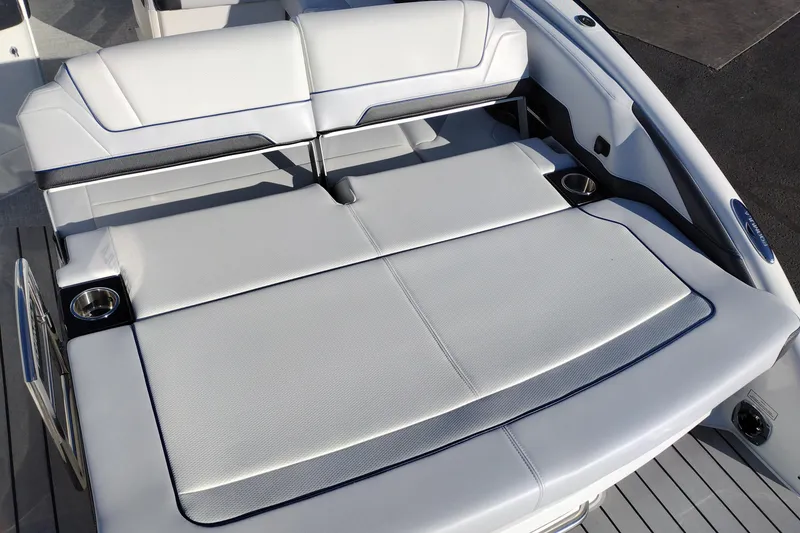 Slide: The Image of 2026 Formula 310 Bowrider interior with white seating and speaker detail. - 62