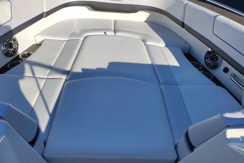 Slide: The Image of 2026 Formula 310 Bowrider deck with sleek, modern design and storage compartment. - 68