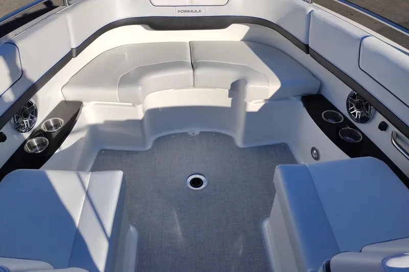 Slide: The Image of 2026 Formula 310 Bowrider boat interior with sleek white design and modern features. - 69