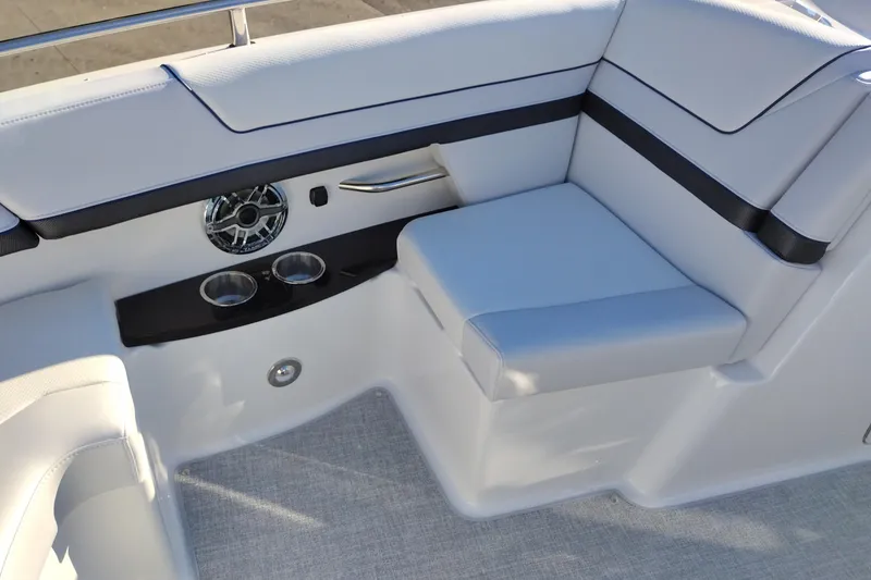 Slide: The Image of 2026 Formula 310 Bowrider interior storage with cushions and equipment. - 71
