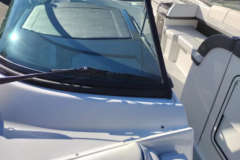 Slide: The Image of 2026 Formula 310 Bowrider interior cabin with control panel and seating. - 72