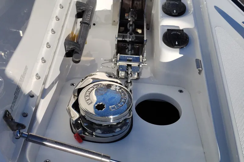 Slide: The Image of 2026 Formula 310 Bowrider dashboard with modern controls and steering wheel. - 77