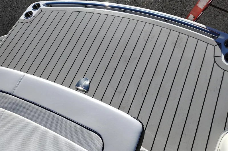 Slide: The Image of Interior of 2026 Formula 310 Bowrider boat featuring a compact sink and toilet area. - 83