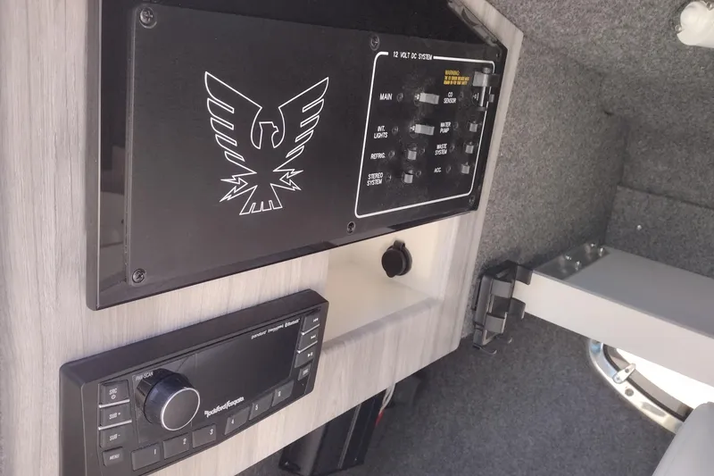 Slide: The Image of Control panel and audio system inside a 2026 Formula 310 Bowrider boat. - 86