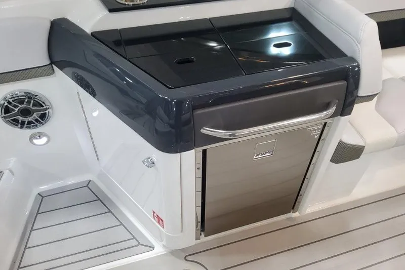 Slide: The Image of 2026 Formula 310 Bowrider interior with sleek kitchenette and modern design. - 91