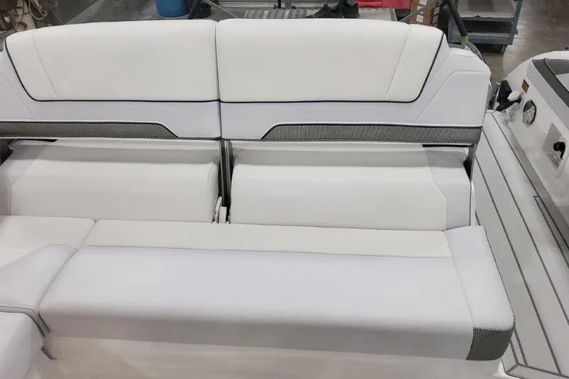 Slide: The Image of 2026 Formula 310 Bowrider interior seating with white upholstery and modern design. - 96