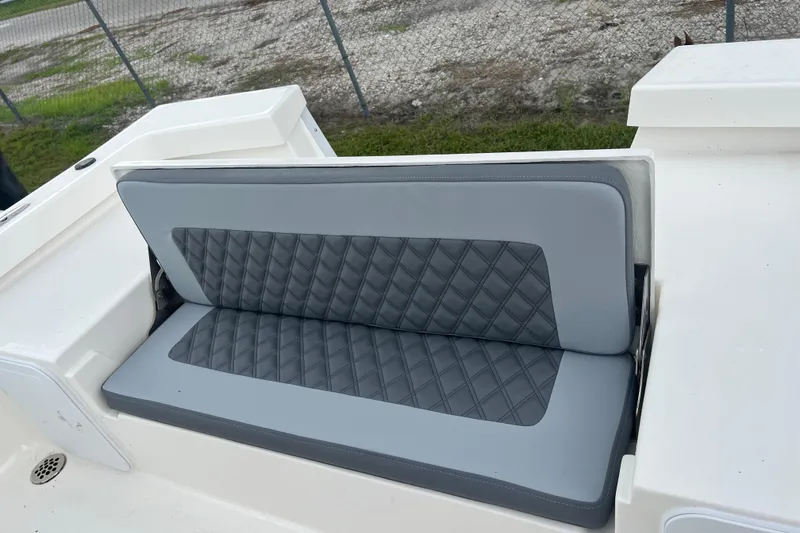 Slide: The Image of 2026 Defiance CATALINA 190 boat seat with gray quilted upholstery. - 11