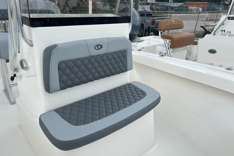 Slide: The Image of 2026 Defiance CATALINA 190 boat interior with gray cushioned seating and modern design. - 15