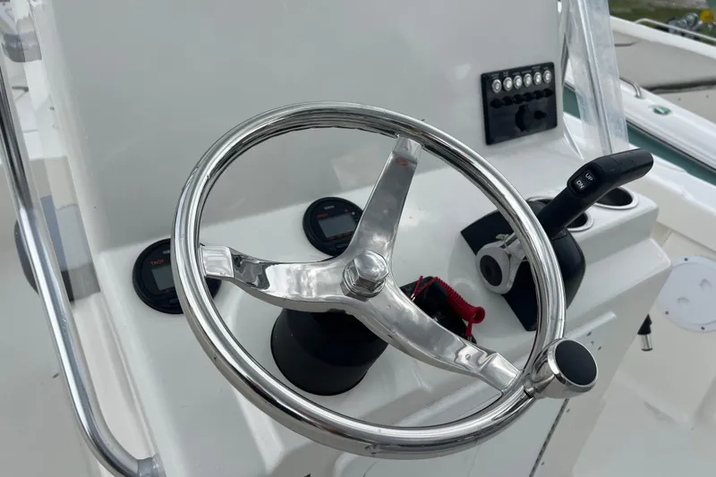 Slide: The Image of Steering console of 2026 Defiance CATALINA 190 boat with controls and gauges. - 7