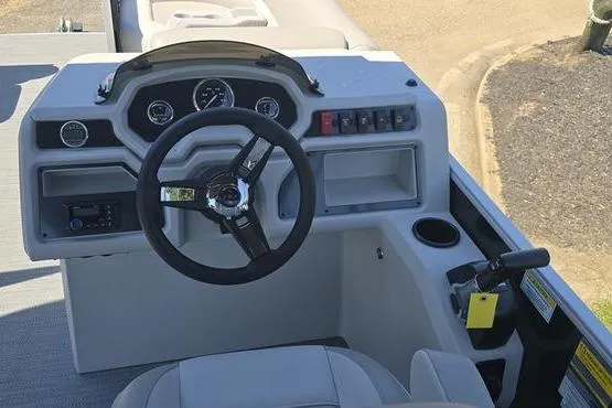 Slide: The Image of 2026 Godfrey Xperience 2286 SBX Sport Tube dashboard with steering wheel and controls. - 11